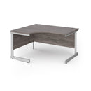 Gray oak Dams Contract 25 ergonomic desk with cantilever legs, featuring a modern design and spacious workspace.
