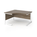 Dams Contract 25 ergonomic desk with Nebraska Oak finish and cantilever legs, featuring a spacious workspace and modern design.