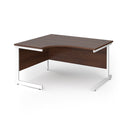 Dams Contract 25 ergonomic walnut desk with cantilever legs, showcasing a spacious workspace and modern office design