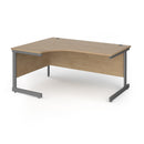 Dams Contract 25 ergonomic oak desk with cantilever legs, featuring a spacious workspace and modern design.
