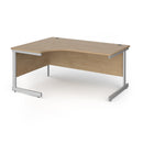Dams Contract 25 ergonomic desk with cantilever legs in Kendal Oak finish, featuring a spacious workspace and modern design.