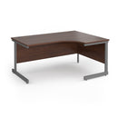 Dams Contract 25 ergonomic walnut desk with cantilever legs, featuring a spacious work surface and modern design.