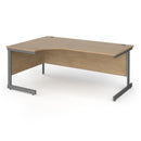 Dams Contract 25 ergonomic oak desk with cantilever legs, featuring a spacious surface and modern design.