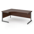 Dams Contract 25 ergonomic desk with walnut finish and cantilever legs, showcasing a sleek, modern workspace setup.