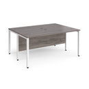 Dams Maestro 25 600mm deep back-to-back straight desks with bench legs in grey oak finish, showing sleek modern office furniture.