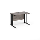 Dams Maestro 25 600mm deep straight desk with grey oak finish and cable-managed leg for organized workspace setup.