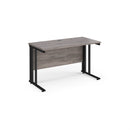 Dams Maestro 25 600mm deep straight desk in grey oak with cable managed leg, modern office furniture with clean lines.