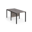 Dams Maestro 25 800mm deep back-to-back straight desks with bench legs in grey oak finish, suitable for office workspace.
