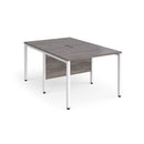 Dams Maestro 25 800mm deep back-to-back straight desks with bench leg in grey oak finish, showing sleek office workspace design.
