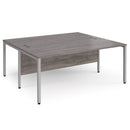 Dams Maestro 25 800mm deep back-to-back straight desks with bench legs in grey oak finish, ideal for office workspace setup.