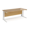 Dams Maestro 25 800mm deep straight desk in oak with cable-managed leg, showcasing sleek design and functional workspace.
