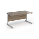 Dams Contract 25 800mm deep straight desk with Nebraska Oak finish and cantilever legs, ideal for office workspace.
