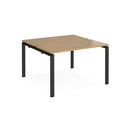 Dams Adapt back-to-back desks with 600mm depth in oak finish, featuring modern office workspace design and sturdy construction.