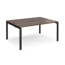 Dams Adapt back-to-back desks in walnut finish, 600mm deep, showing sleek tabletop and sturdy legs for office or workspace setup.