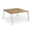 Dams Connex Plus angled back to back desk in oak wood with sleek, modern design and spacious work surface.