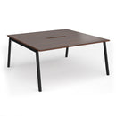 Dams Connex Plus Angled Back To Back Desk in walnut wood with sleek, modern design and spacious workspace.