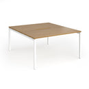 Dams Connex Plus Goal-Post Back To Back Desk in oak wood finish, showing the modern office workspace with dual work surfaces.