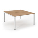 Dams Connex scalloped back-to-back desks in beech wood, featuring a modern design with smooth surfaces and back-to-back configuration.