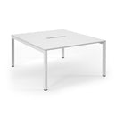 White Connex scalloped back-to-back desks by Dams, showing sleek design and spacious work surfaces in a modern office setting.