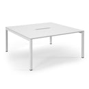 White Connex scalloped back-to-back desks by Dams, showing the sleek, modern design with interconnected work surfaces and clean lines.