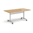 Rectangular Dams Deluxe Fliptop Meeting Table in oak with black frame, showcasing its smooth fliptop surface for versatile use.