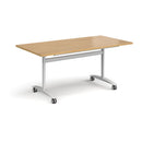 Rectangular Deluxe Fliptop Meeting Table by Dams with oak finish, black base, and fliptop design for versatile office use.
