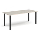 Light grey rectangular radial leg meeting table by Dams with sturdy metal legs, ideal for conference or meeting rooms.