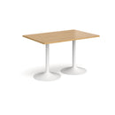 Dams Genoa rectangular dining table with oak finish and trumpet metal base, showcasing its modern design and spacious surface.