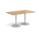 Dams Genoa rectangular oak dining table with a sleek trumpet base, showcasing modern design and wood grain detail.