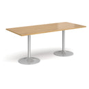 Dams Genoa rectangular oak dining table with a sleek trumpet base, showcasing a modern and elegant design.