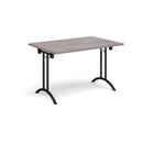 Grey oak rectangular folding leg table with curved foot rails by Dams, showing the smooth surface and sturdy frame.