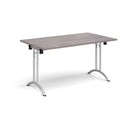 Grey oak rectangular folding leg table with curved foot rails by Dams, showcasing its sturdy frame and sleek design.