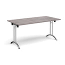Dams rectangular folding leg table with grey oak finish and curved foot rails, showing a sturdy, versatile design for dining or work.