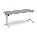 Gray oak rectangular folding leg table with curved foot rails by Dams, showcasing its sturdy frame and smooth surface.