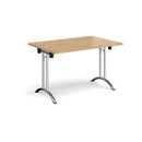 Dams rectangular folding leg table with curved foot rails in oak wood, showcasing its sturdy design and natural wood finish.