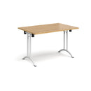 Dams rectangular folding leg table with curved foot rails in oak finish, showing smooth surface and sturdy foldable legs.