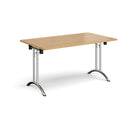 Dams rectangular folding leg table with curved foot rails in oak finish, showcasing sturdy construction and sleek design.