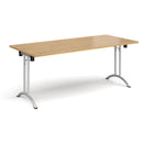 Dams rectangular folding leg table with curved foot rails in oak finish, showcasing smooth surface and sturdy design.
