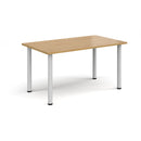Rectangular radial leg meeting table in oak wood with Dams branding, showcasing a modern office or conference table design.