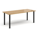Rectangular radial leg meeting table in oak wood with Dams branding, showcasing a spacious conference table design.
