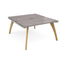 Two grey oak Fuze Back To Back desks by Dams arranged in an office setting with clean, modern design and ample workspace.