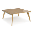 Dams Fuze Back To Back Desks in oak wood with sleek, modern design, featuring spacious work surfaces and sturdy legs.