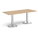 Dams Pisa rectangular dining table with Kendal Oak finish and round chrome bases, showcasing a modern wood and metal design.