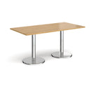 Dams Pisa rectangular dining table with oak top and round chrome bases, showcasing a modern and stylish kitchen or dining room setup.