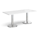 White Pisa rectangular dining table by Dams with round chrome bases, featuring a sleek modern design.