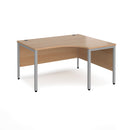Dams Maestro 25 ergonomic desk with bench leg in beech finish, shown from the left side with a sleek black frame.