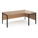 Dams Maestro 25 ergonomic desk with bench leg in beech wood finish, shown from the left side.