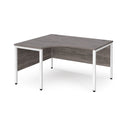 Dams Maestro 25 ergonomic desk with bench leg in grey oak finish, featuring a spacious work surface and modern design.