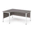 Dams Maestro 25 ergonomic grey oak desk with bench leg, featuring a spacious work surface and modern design.
