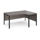 Dams Maestro 25 ergonomic desk with bench leg in grey oak finish, featuring a modern workspace design and sturdy construction.
